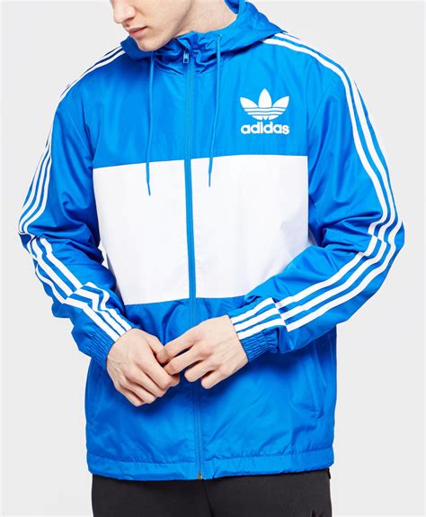 black and blue adidas jacket|adidas originals blue jacket.